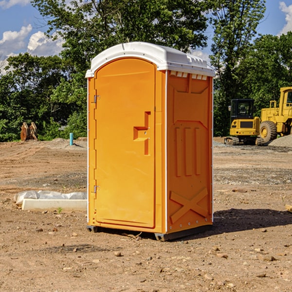 how often are the porta potties cleaned and serviced during a rental period in Tate